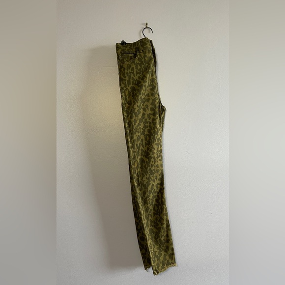 A comfortable pair of pants, "In olive green with black (leopard) spots." - Picture 1 of 3